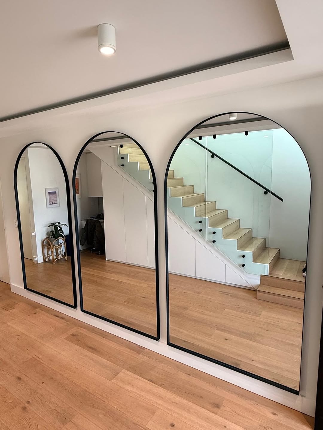 Triple-arch mirrors installed in a Sydney home